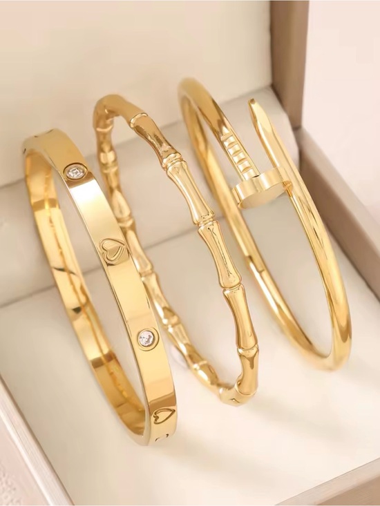 The Unbranded Brand Jewelry - 3 pc 18K Gold Plated Stainless Steel Stackable Bracelets.